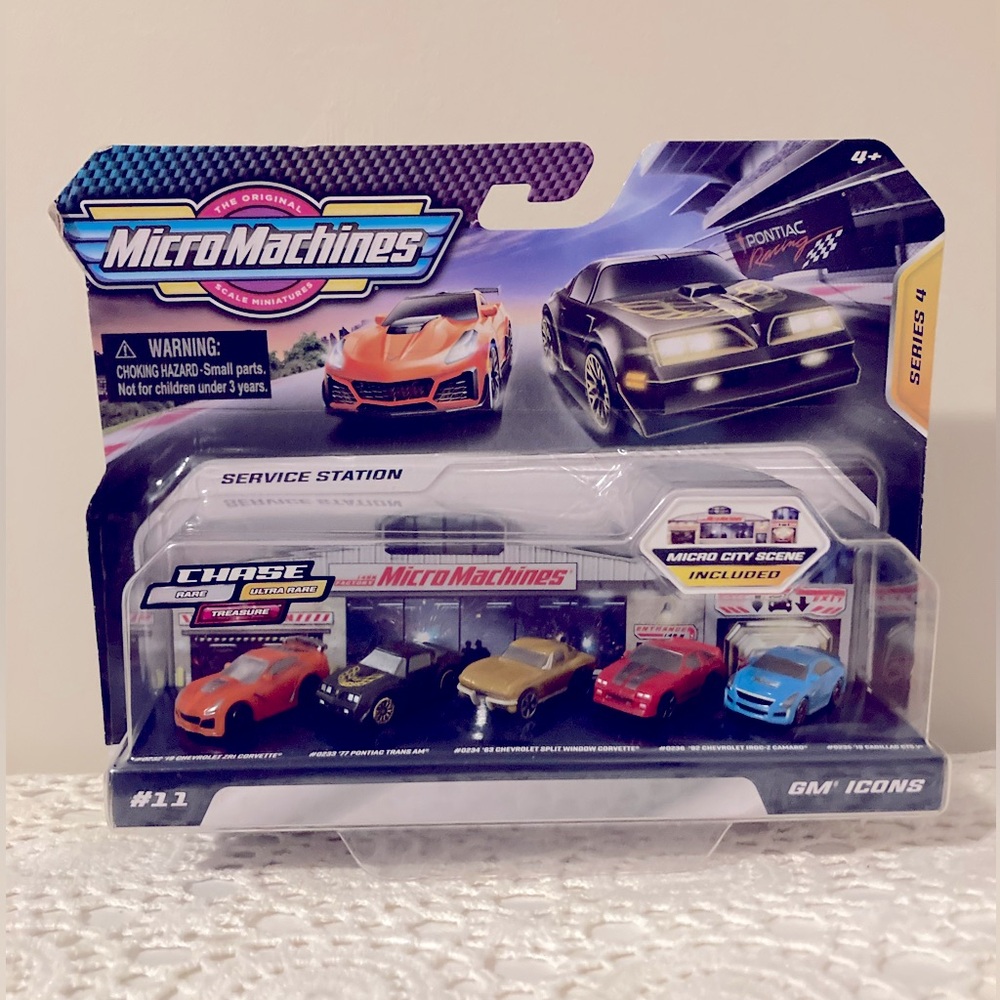 New in package Micro Machines World Pack Series 4 #11 Corvette Chevy Cadillac